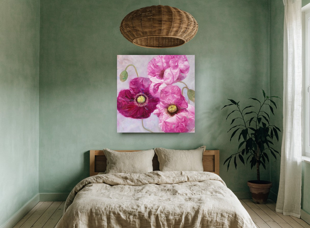 Magenta Poppy Trio floral canvas print on the wall of a bedroom