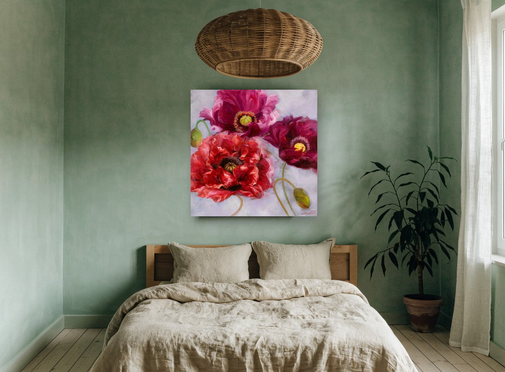 Crimson Poppy Trio floral canvas print on the wall of a bedroom
