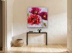 Crimson Poppy Trio floral canvas print on the wall of a hallway