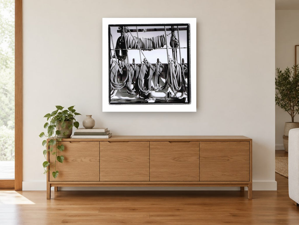 Coiled Rigging Lines coastal canvas print on the wall of a living room above a sideboard