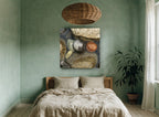 Wet Pebble Pool coastal canvas print on the wall of a bedroom