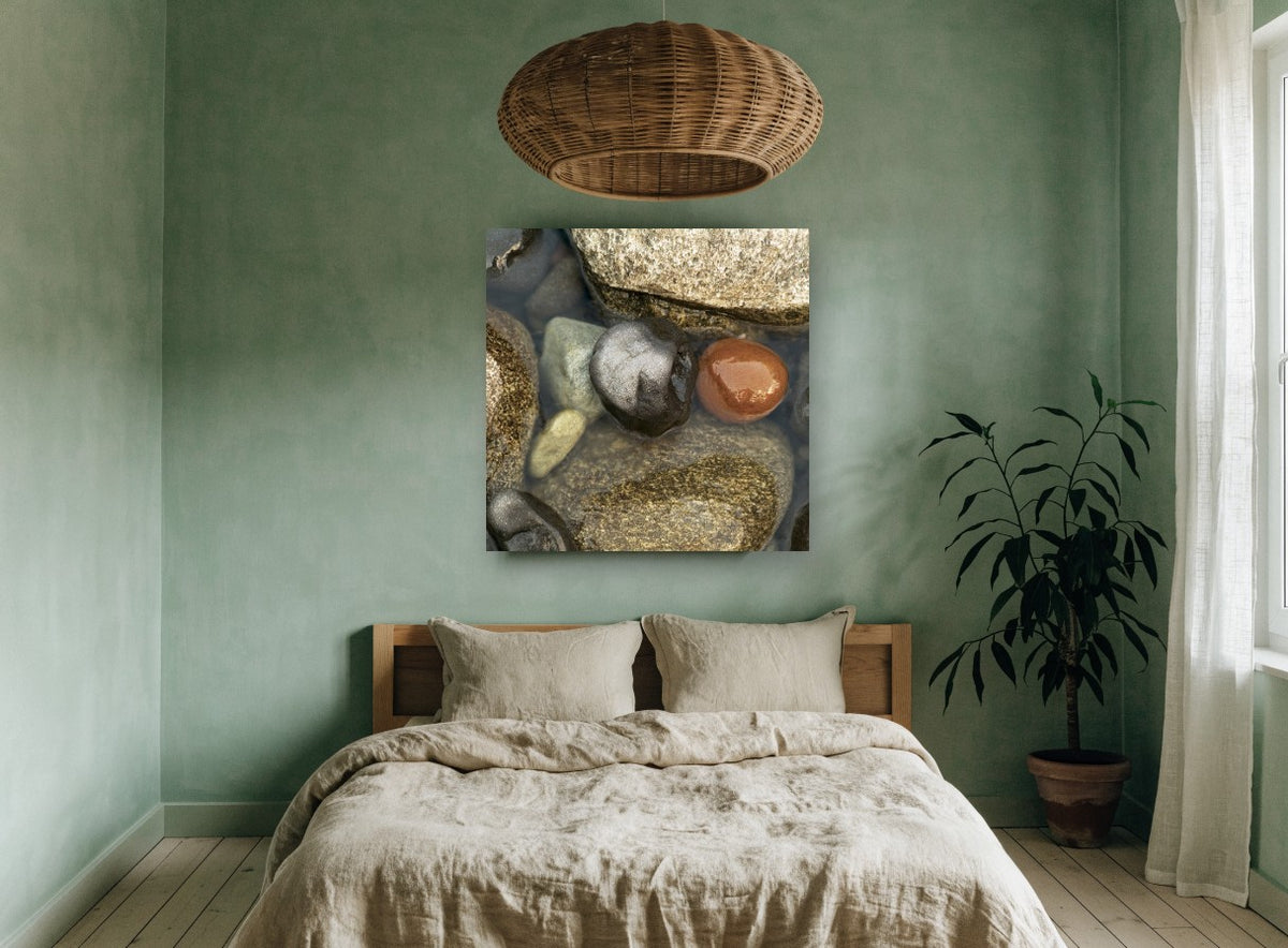 Wet Pebble Pool coastal canvas print on the wall of a bedroom