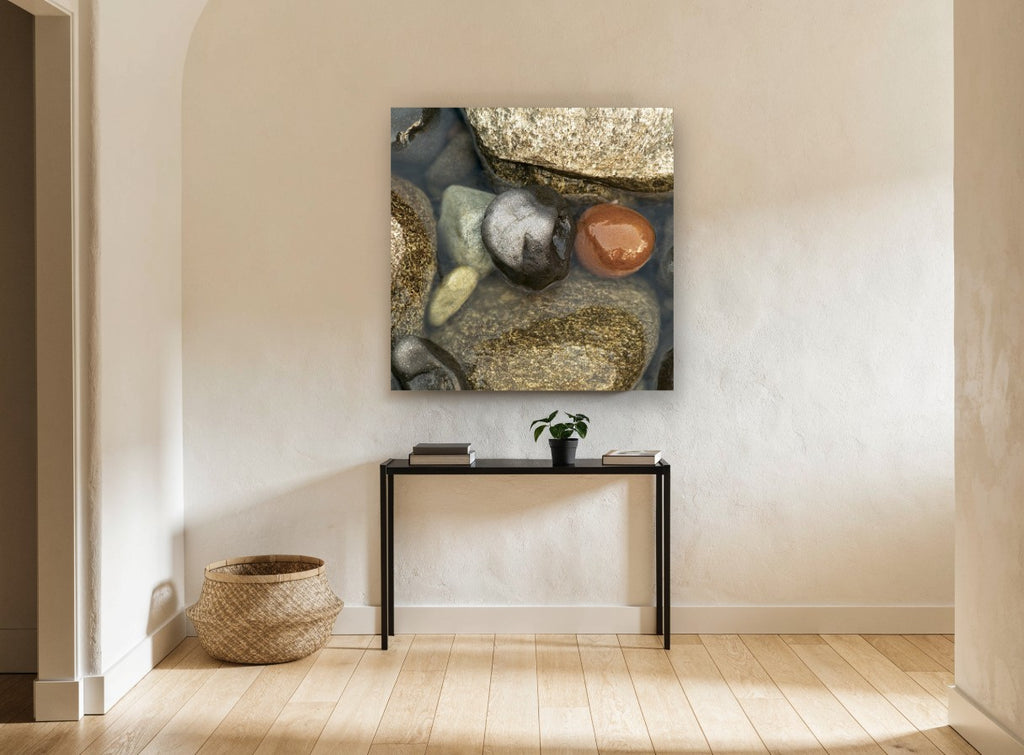 Wet Pebble Pool coastal canvas print on the wall of a hallway
