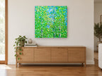 Aspen Canopy Bloom floral canvas print on the wall of a living room above a sideboard