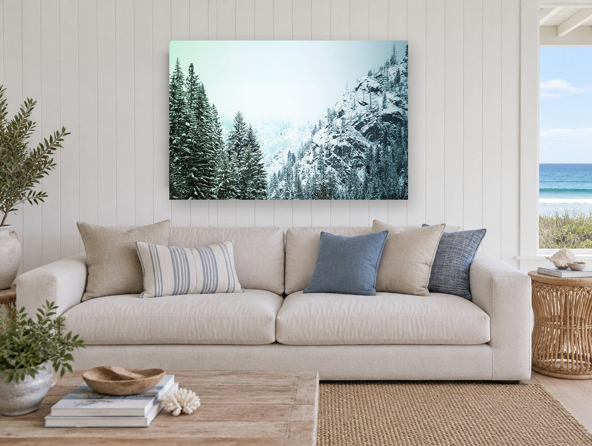 Frosted Pine Ridge landscape canvas print on the wall of a beach house living room