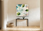 Translucent Teal Blossoms floral canvas print on the wall of a hallway