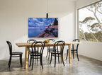 Beacon Reflections coastal canvas print on the wall of a dining room