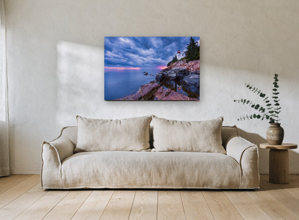 Beacon Reflections coastal canvas print on the wall of a living room