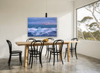 Ice in the Surf coastal canvas print on the wall of a dining room