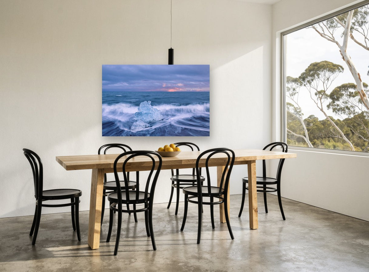 Ice in the Surf coastal canvas print on the wall of a dining room