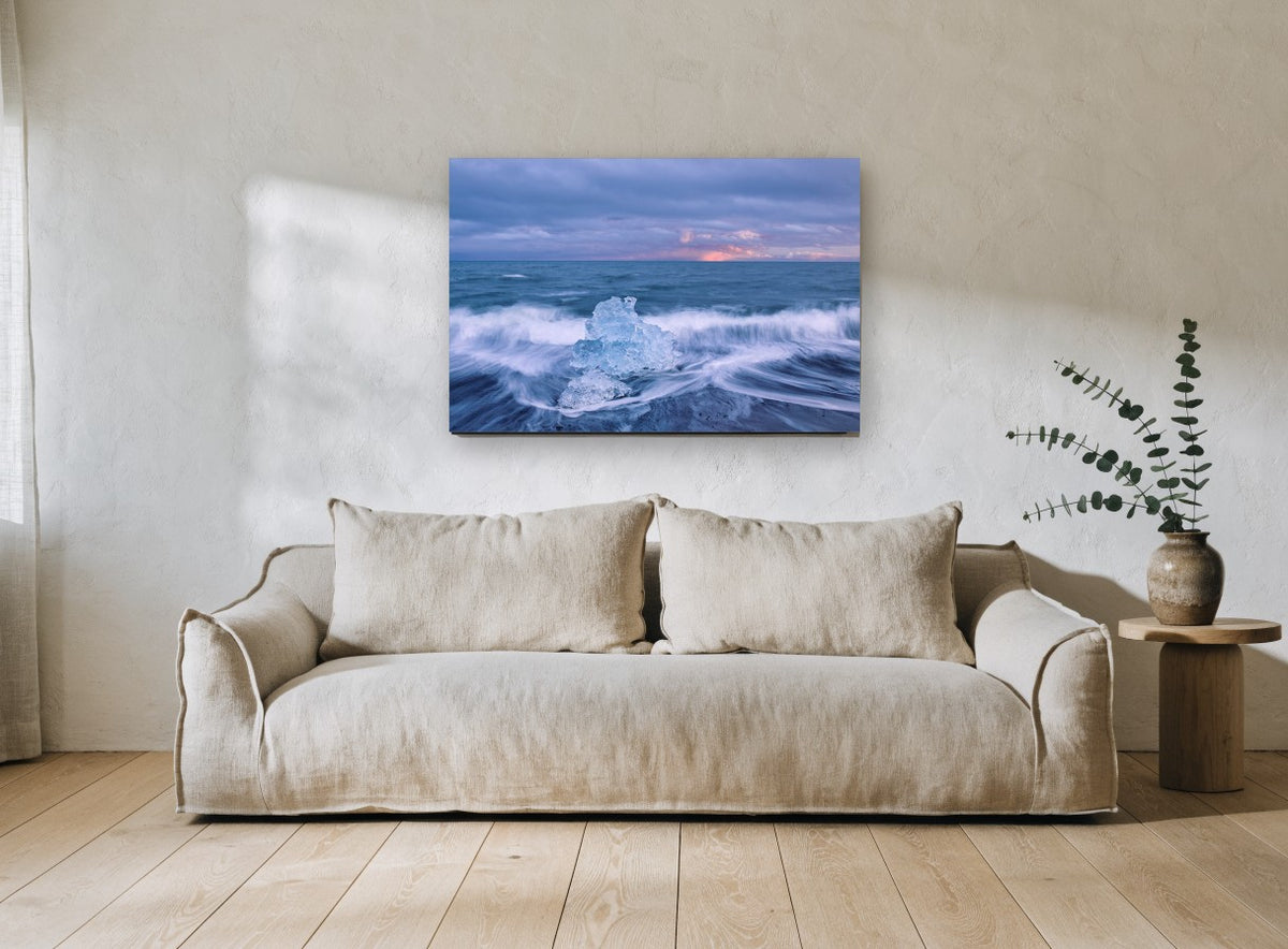 Ice in the Surf coastal canvas print on the wall of a living room
