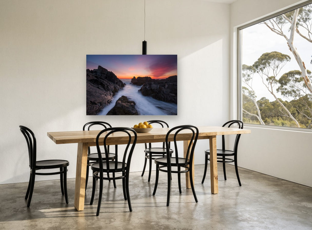 Granite Channel Dusk coastal canvas print on the wall of a dining room