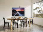 Granite Channel Dusk coastal canvas print on the wall of a dining room