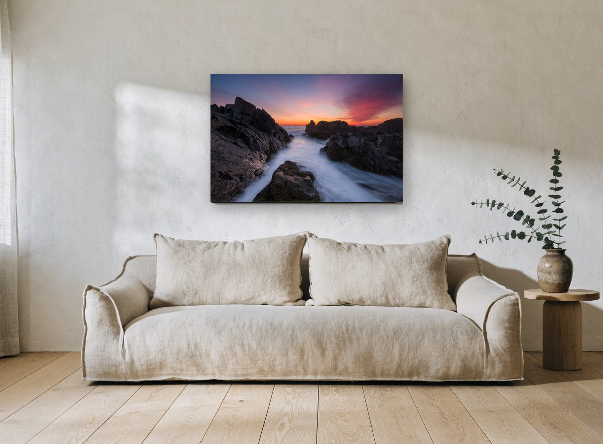 Granite Channel Dusk coastal canvas print on the wall of a living room