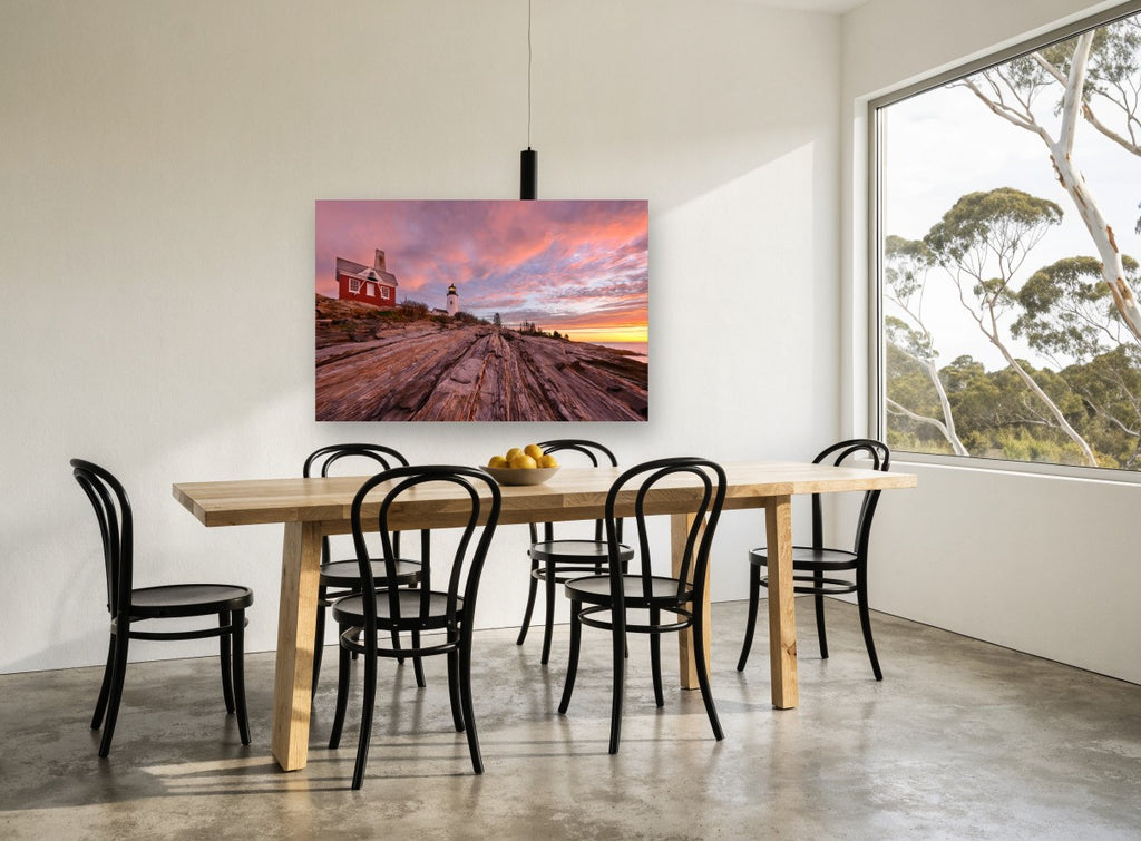 Lighthouse Granite Dawn coastal canvas print on the wall of a dining room