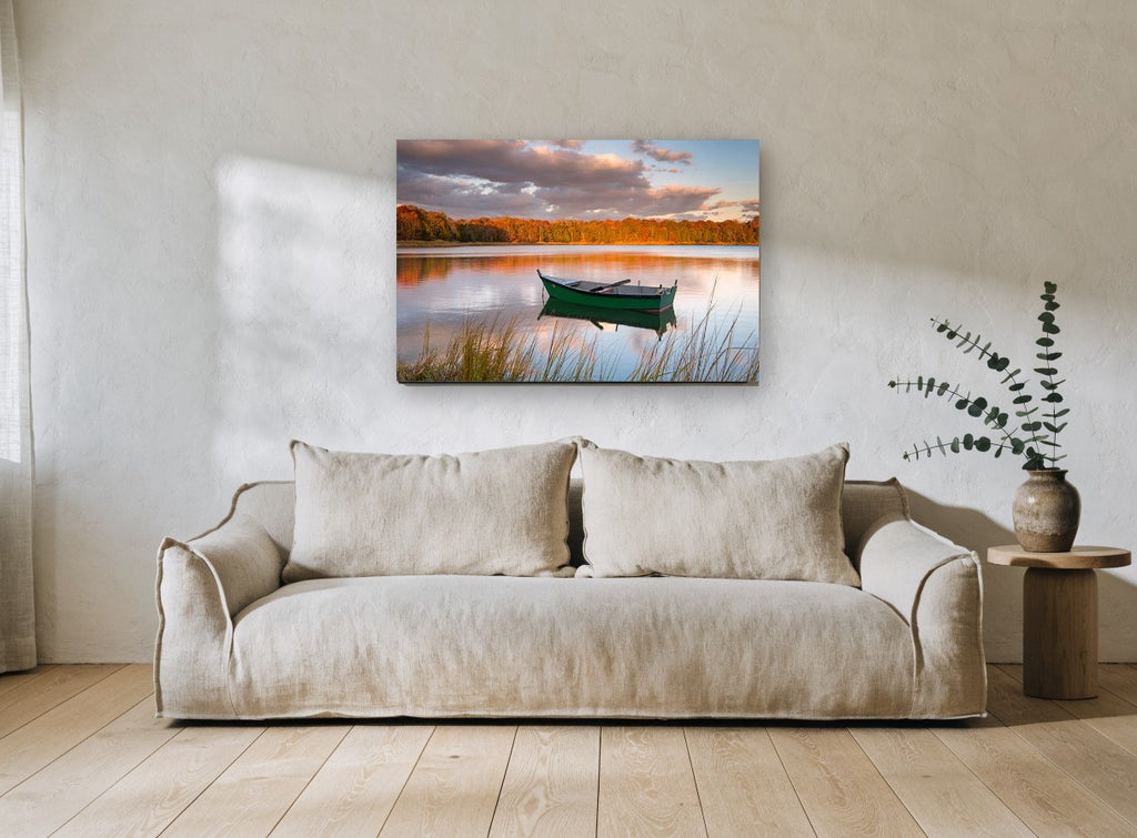 Green Boat at Dusk landscape canvas print on the wall of a living room