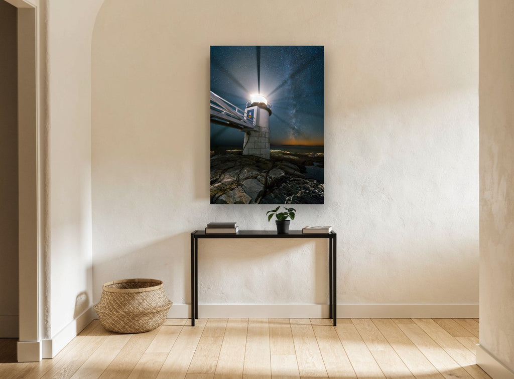 Lighthouse Under Milky Way coastal canvas print on the wall of a hallway