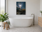 Lighthouse Under Milky Way coastal canvas print on the wall of a bathroom