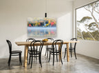 Autumn Chapel Mist landscape canvas print on the wall of a dining room