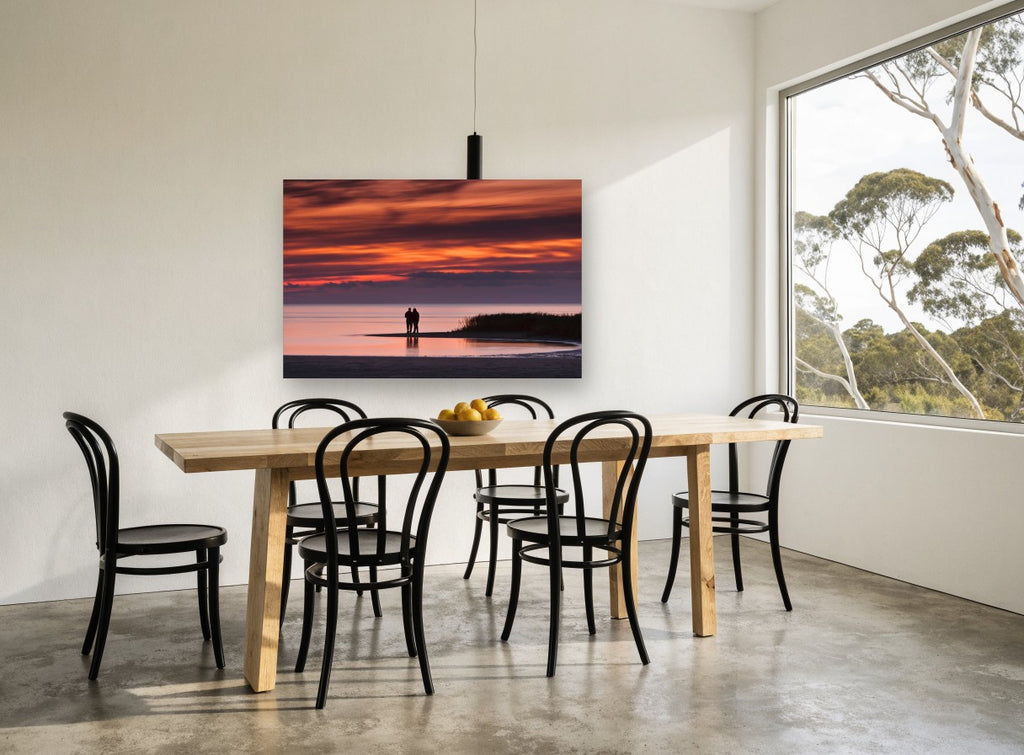 Couple at Dusk Shore coastal canvas print on the wall of a dining room