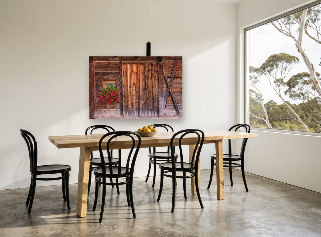 Geraniums on Weathered Timber floral canvas print on the wall of a dining room