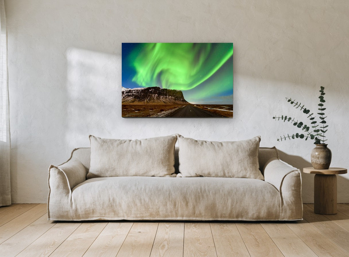 Green Lights Over Cliff landscape canvas print on the wall of a living room