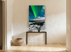Green Aurora Over Snowy Peak coastal canvas print on the wall of a hallway