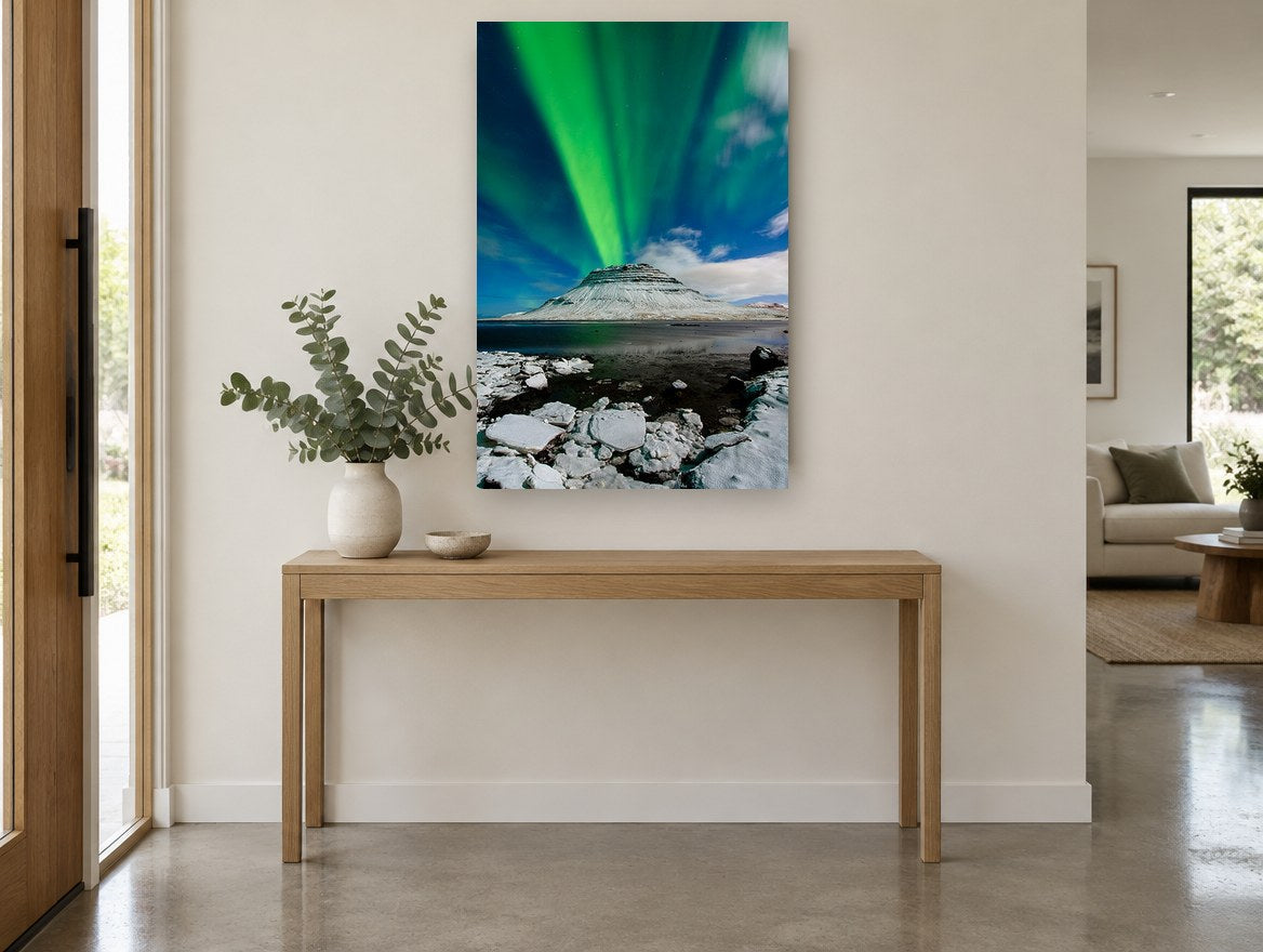 Green Aurora Over Snowy Peak coastal canvas print on the wall of a entry hall