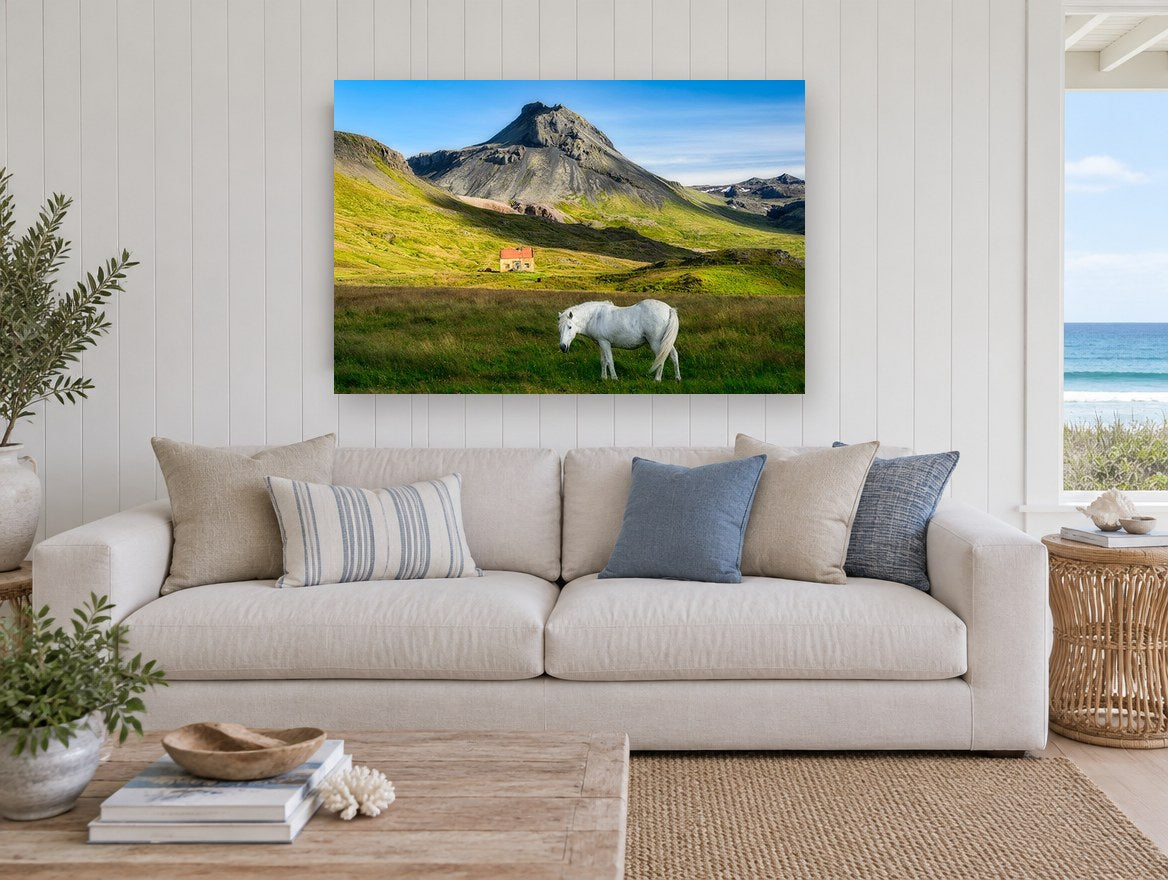 White Horse Below Peak landscape canvas print on the wall of a beach house living room