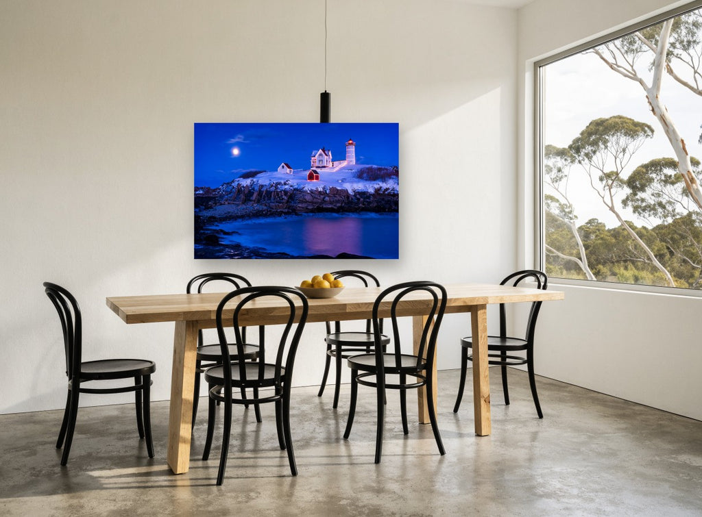 Nubble Winter Night coastal canvas print on the wall of a dining room