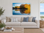 Golden Shoreline Stillness landscape canvas print on the wall of a beach house living room