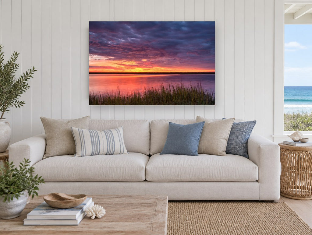 Marsh Afterglow landscape canvas print on the wall of a beach house living room