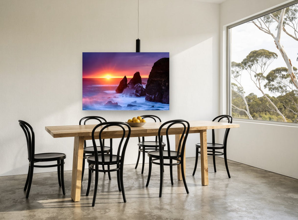 Sunset Sea Stacks coastal canvas print on the wall of a dining room