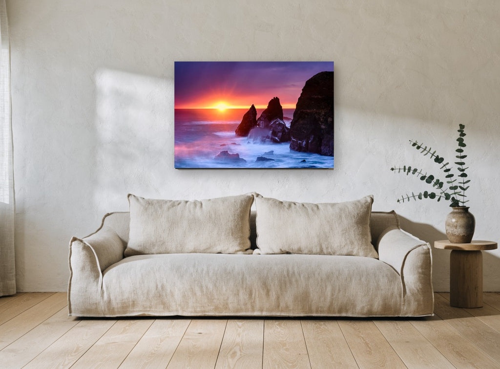 Sunset Sea Stacks coastal canvas print on the wall of a living room
