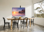 Frozen Pier Sunrise coastal canvas print on the wall of a dining room