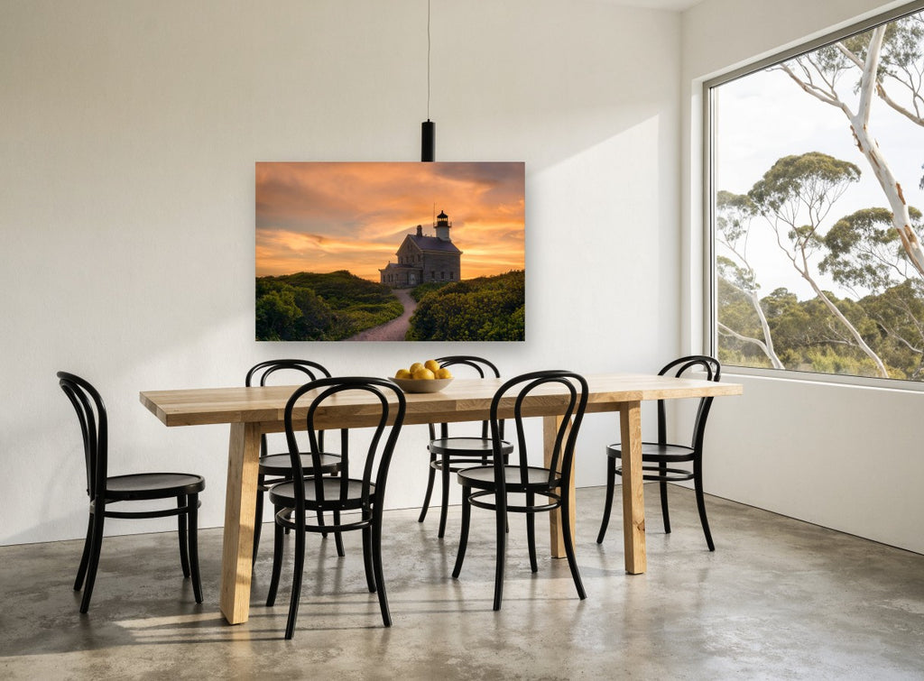 Lighthouse At Dusk landscape canvas print on the wall of a dining room