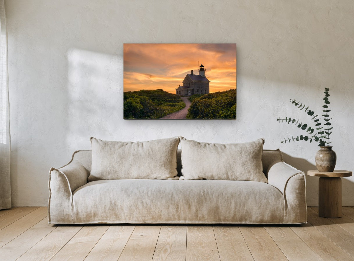 Lighthouse At Dusk landscape canvas print on the wall of a living room
