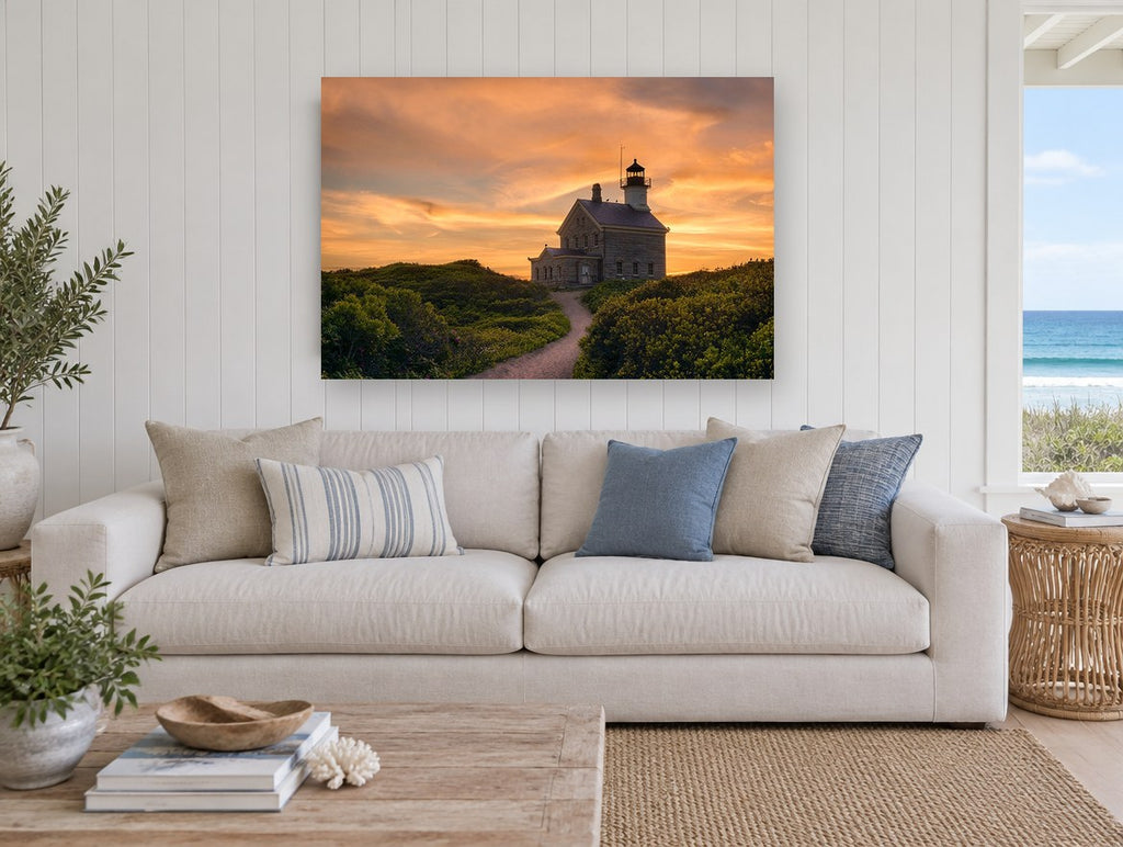 Lighthouse At Dusk landscape canvas print on the wall of a beach house living room