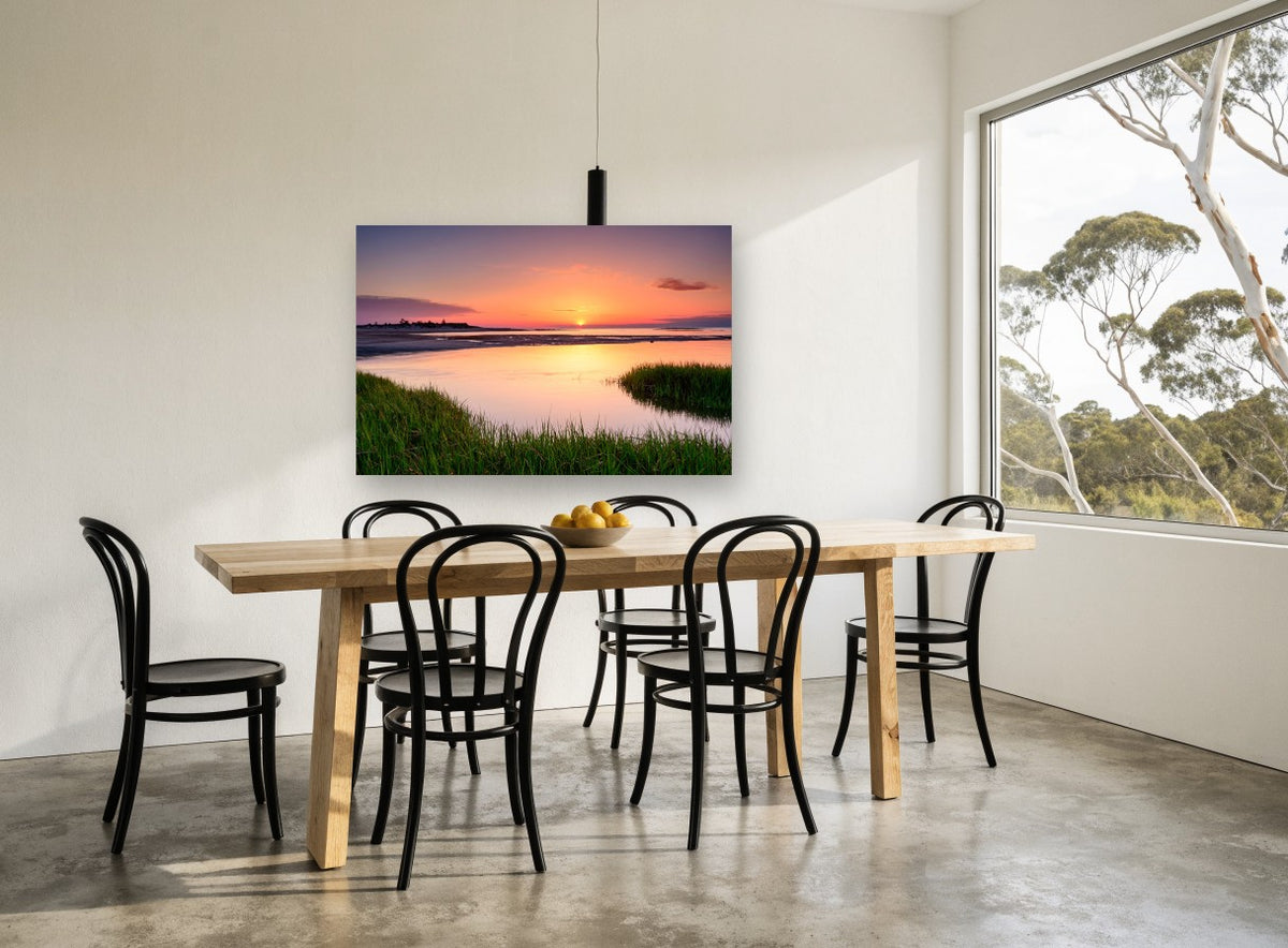 Marsh Tide Sunset coastal canvas print on the wall of a dining room