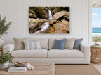 Autumn Falls Gorge landscape canvas print on the wall of a beach house living room