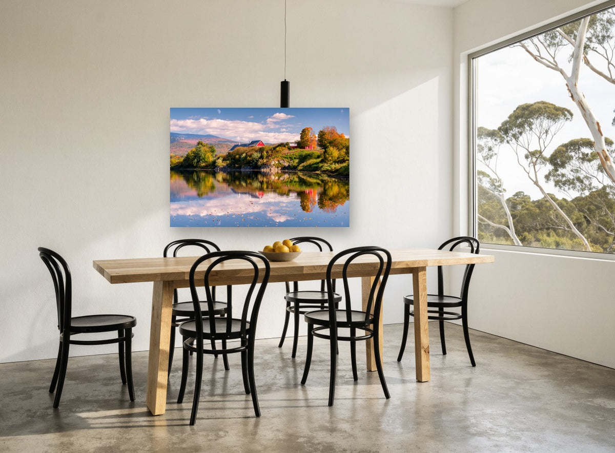 Red Barn Autumn Reflection landscape canvas print on the wall of a dining room