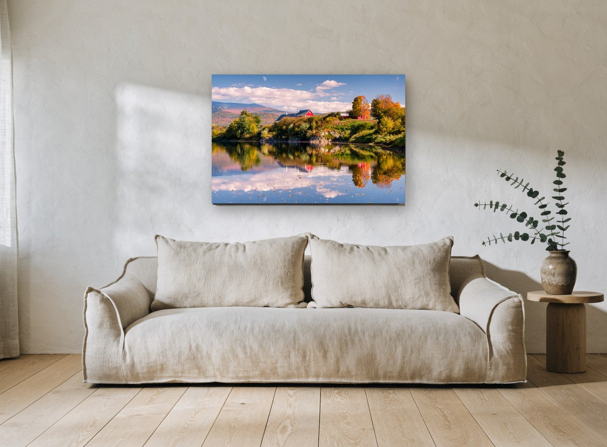 Red Barn Autumn Reflection landscape canvas print on the wall of a living room