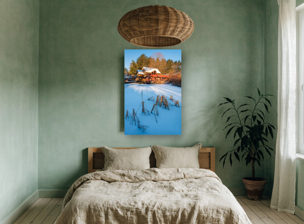 Frozen Mill Pond landscape canvas print on the wall of a bedroom