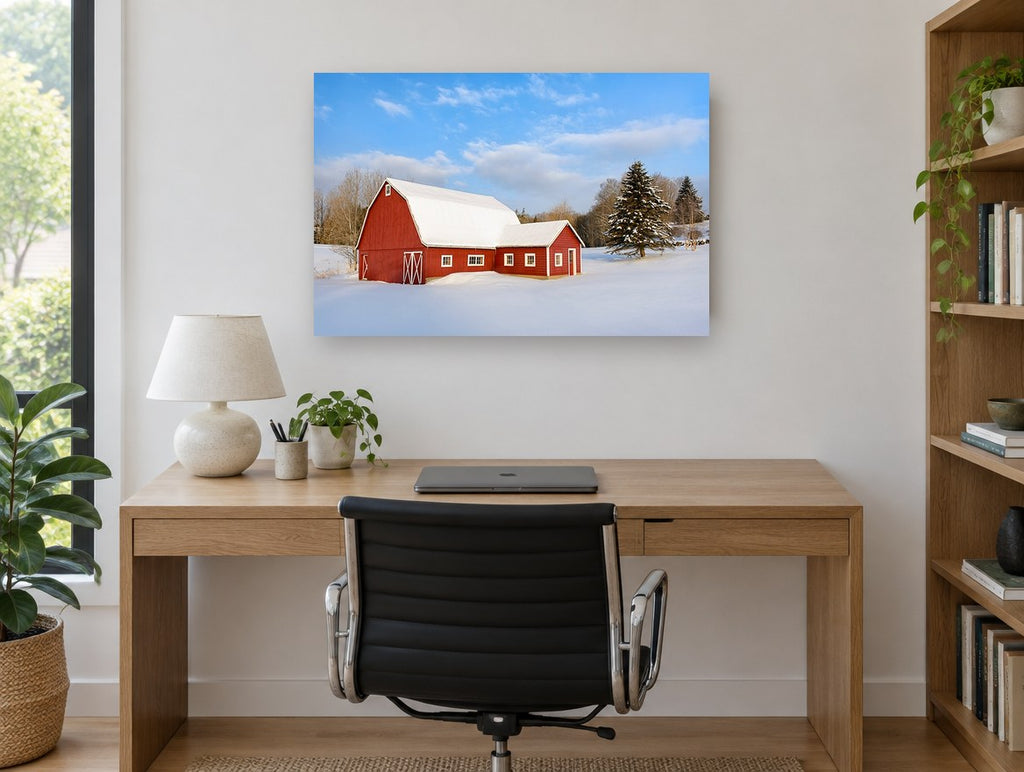 Red Barn Winter Light landscape canvas print on the wall of a study