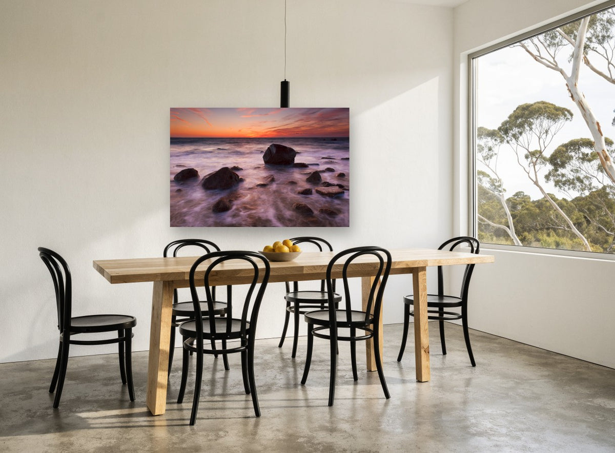 Silken Dusk Boulders coastal canvas print on the wall of a dining room