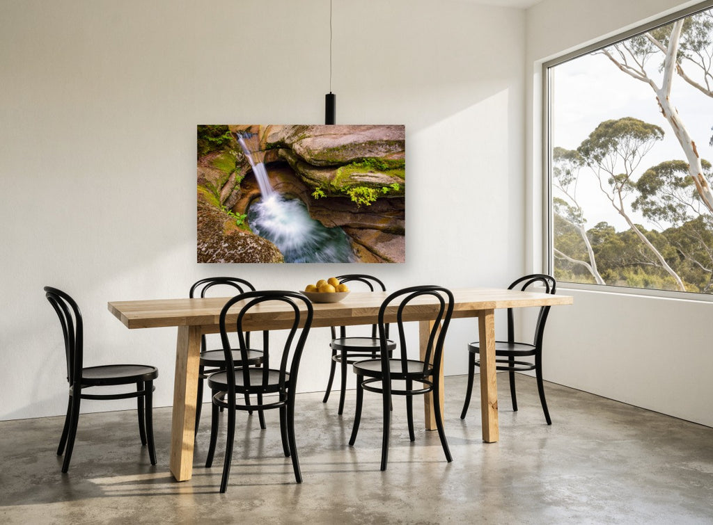 Mossy Rock Punchbowl landscape canvas print on the wall of a dining room
