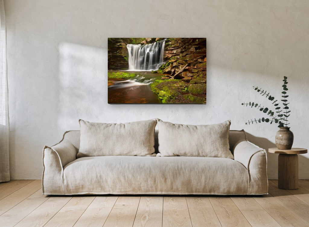 Mossy Ledge Falls landscape canvas print on the wall of a living room