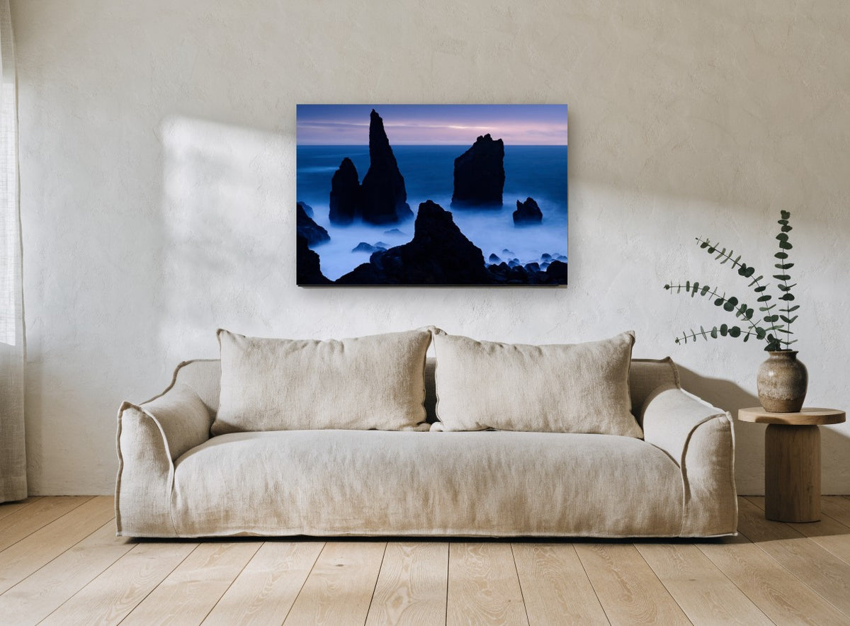 Blue Hour Sea Stacks coastal canvas print on the wall of a living room