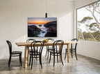Sunrise Rock Channel coastal canvas print on the wall of a dining room