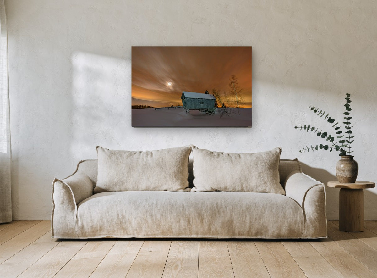 Winter Glow Bridge landscape canvas print on the wall of a living room
